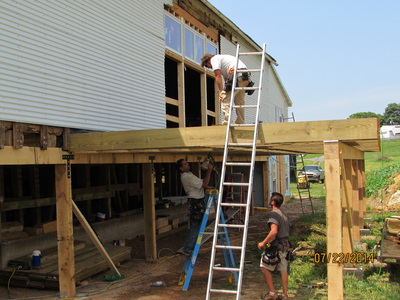 Adding a back deck during barn renovation for wedding venue in Virginia.
