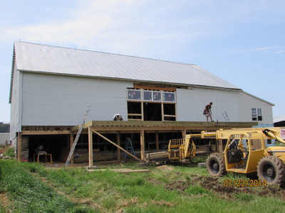 Adding a back deck during barn renovation for wedding venue in Virginia.