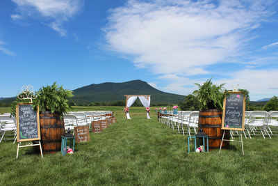 Outdoor ceremony site with mountain view at VA wedding venue.